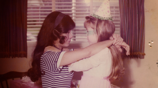Cover Photo: An image of the author on her birthday as a child. She and her mother rest their arms on each other’s shoulders and are looking at each other. 